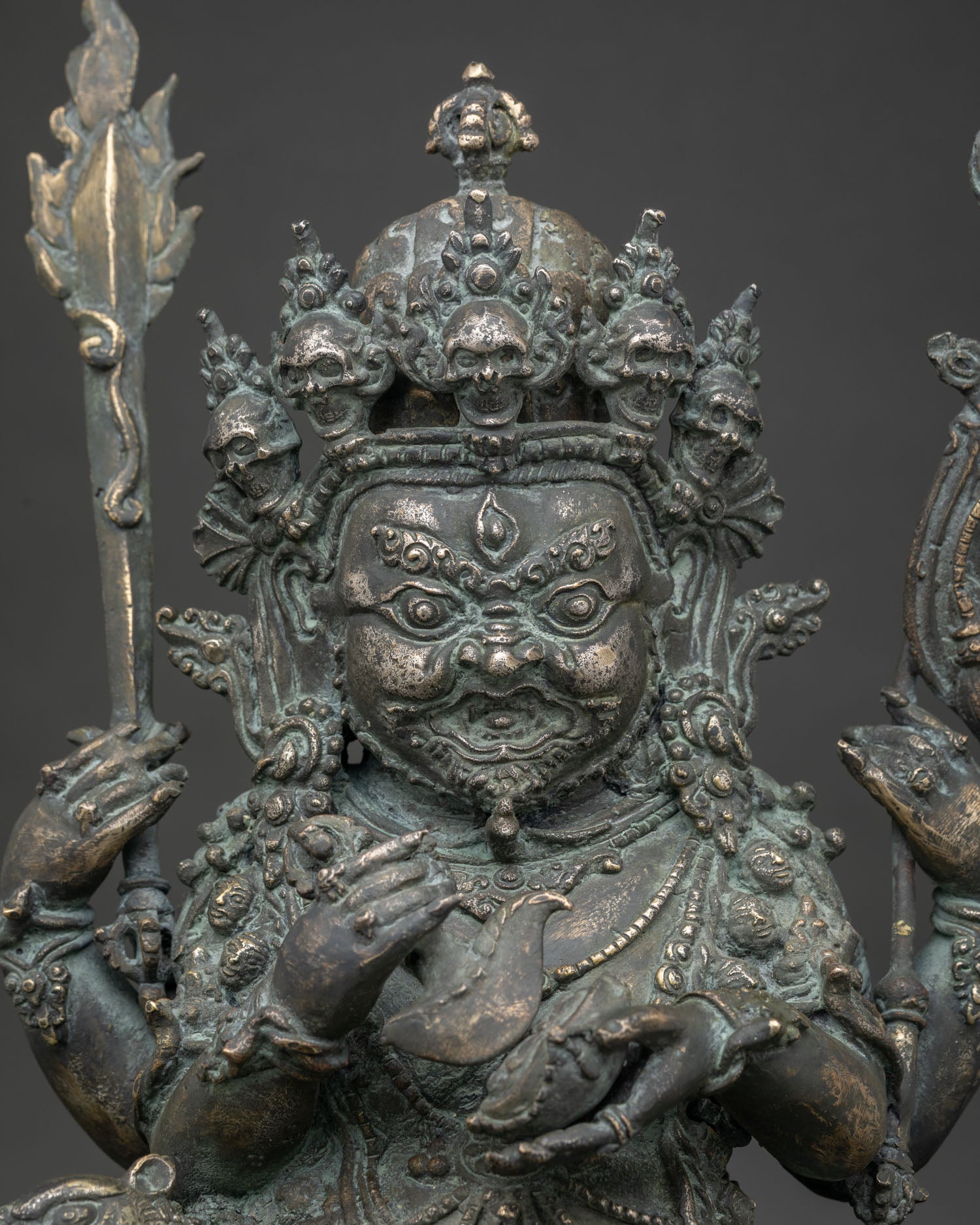 Bronze Four-Armed Mahakala Statue Thailand close up, Tibetan protector deity sculpture detail