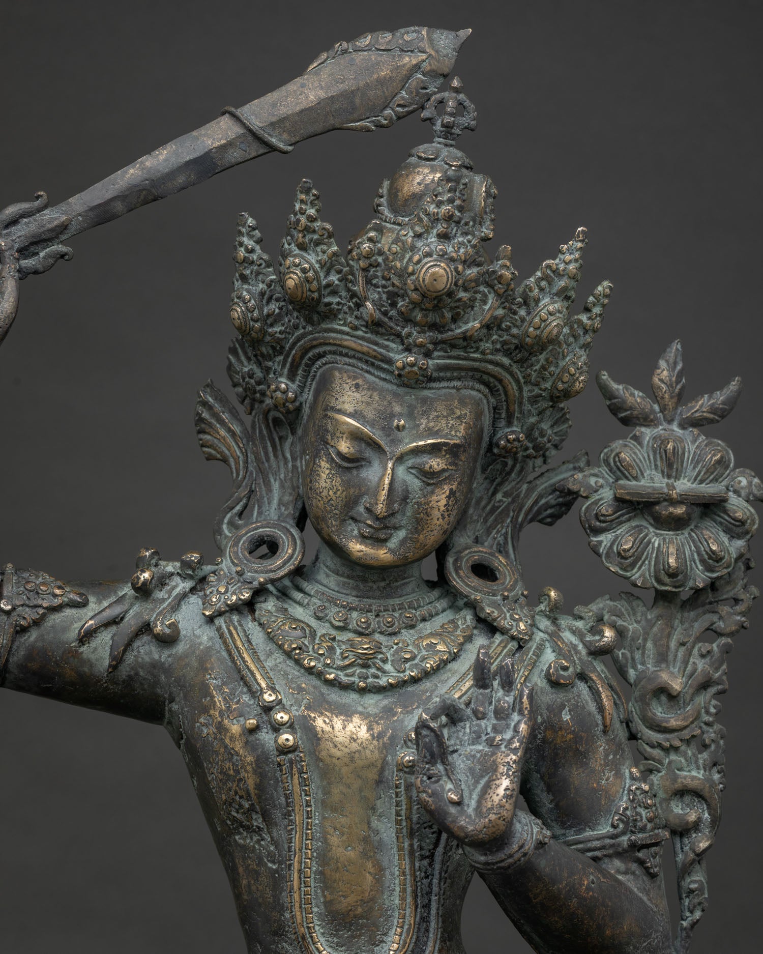 Bronze Manjushri Statue Luang Prabang, close up, Nepalese Buddhist bodhisattva sculpture detail