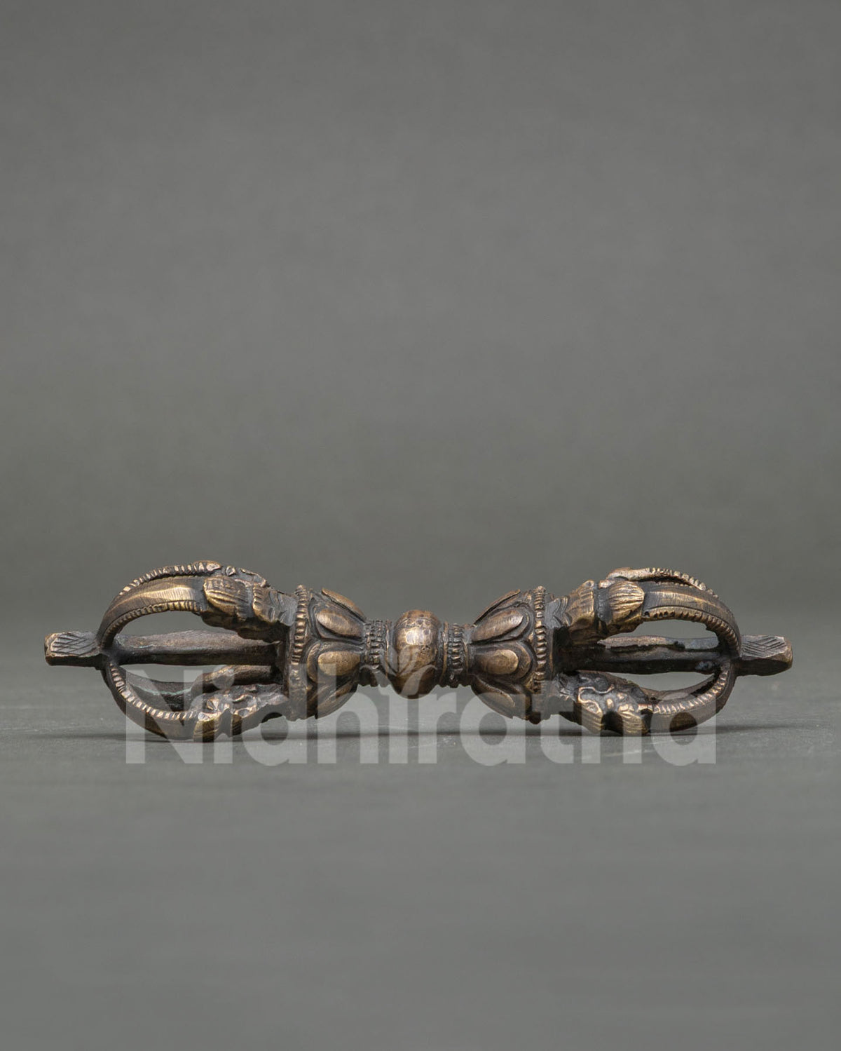 Bronze Vajra Dorje with intricate patterns for traditional Vajrayana Buddhist rituals