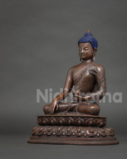 Buddha seated on a hand carved double lotus pedestal in earth touching mudra