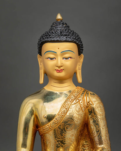 Buddha Shakyamuni Statue featuring a peaceful, serene gold-painted face, and radiant 24K gold fire-gilding.