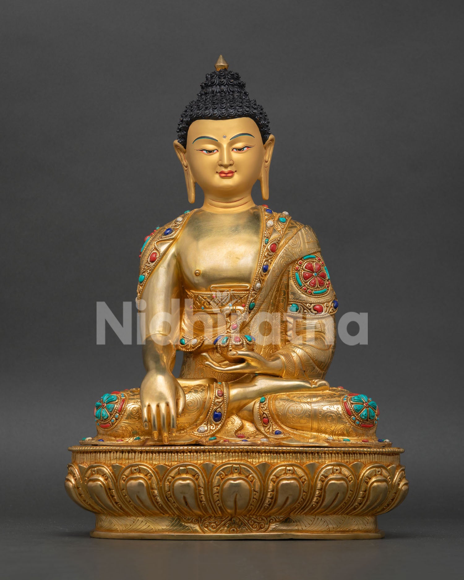 Buddha Shakyamuni, statue handcrafted in Nepal with gold gilded copper and peaceful expression