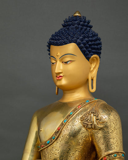 Buddha Shakyamuni Statue head side angle showing gold fire-gilding and facial features