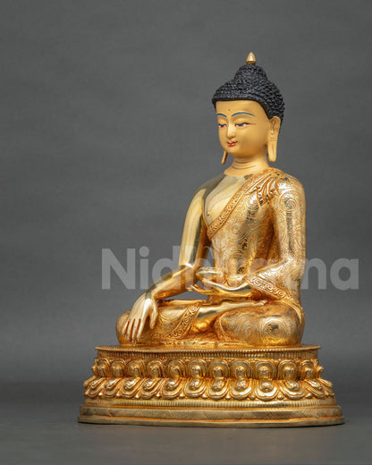 Buddha Shakyamuni Statue seated in vajra posture on a lotus pedestal, symbolizing enlightenment, wisdom, compassion, and inner peace.