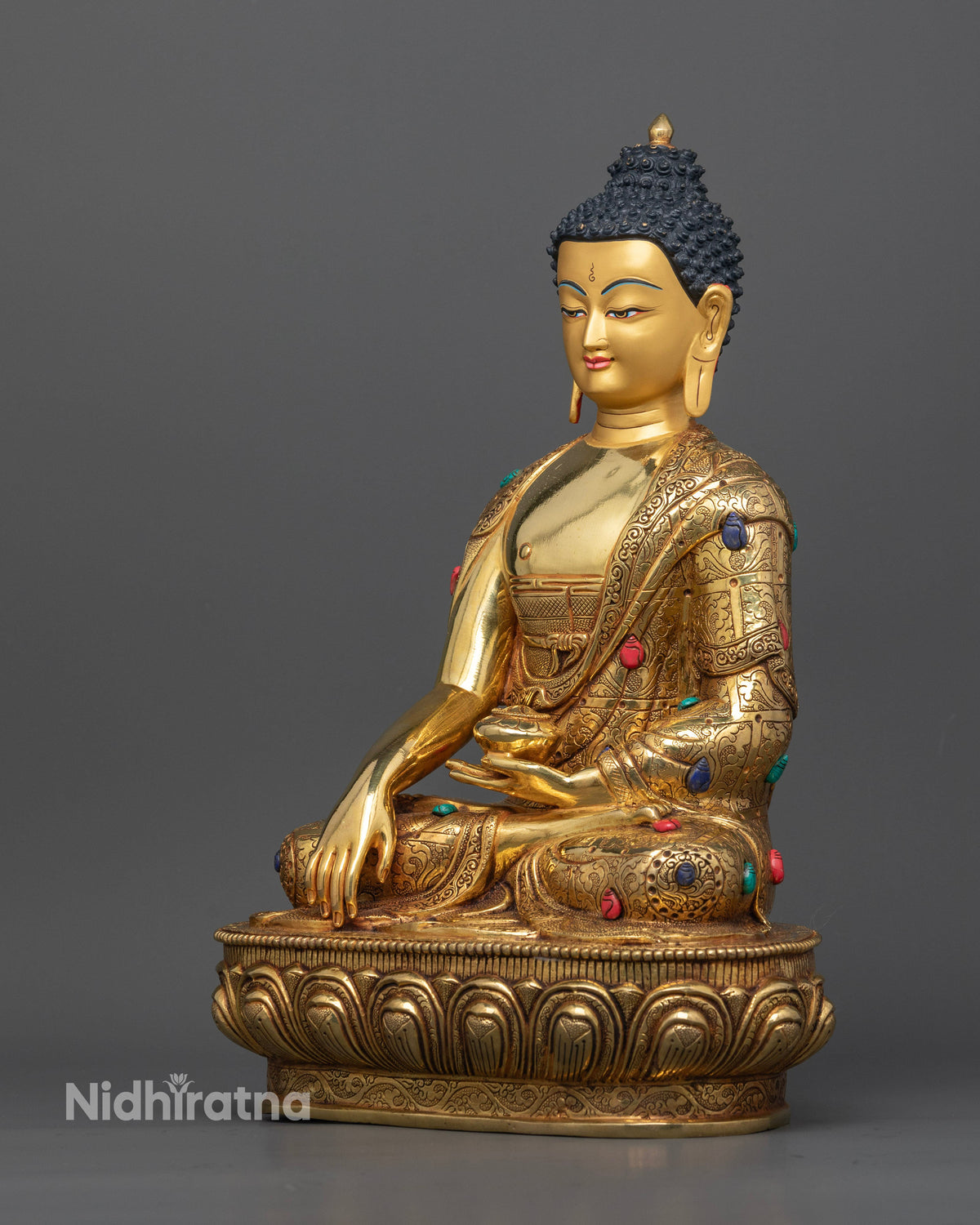 Buddha Shakyamuni statue seated on a lotus pedestal in Bhumisparsha Mudra holding a sacred alms bowl.