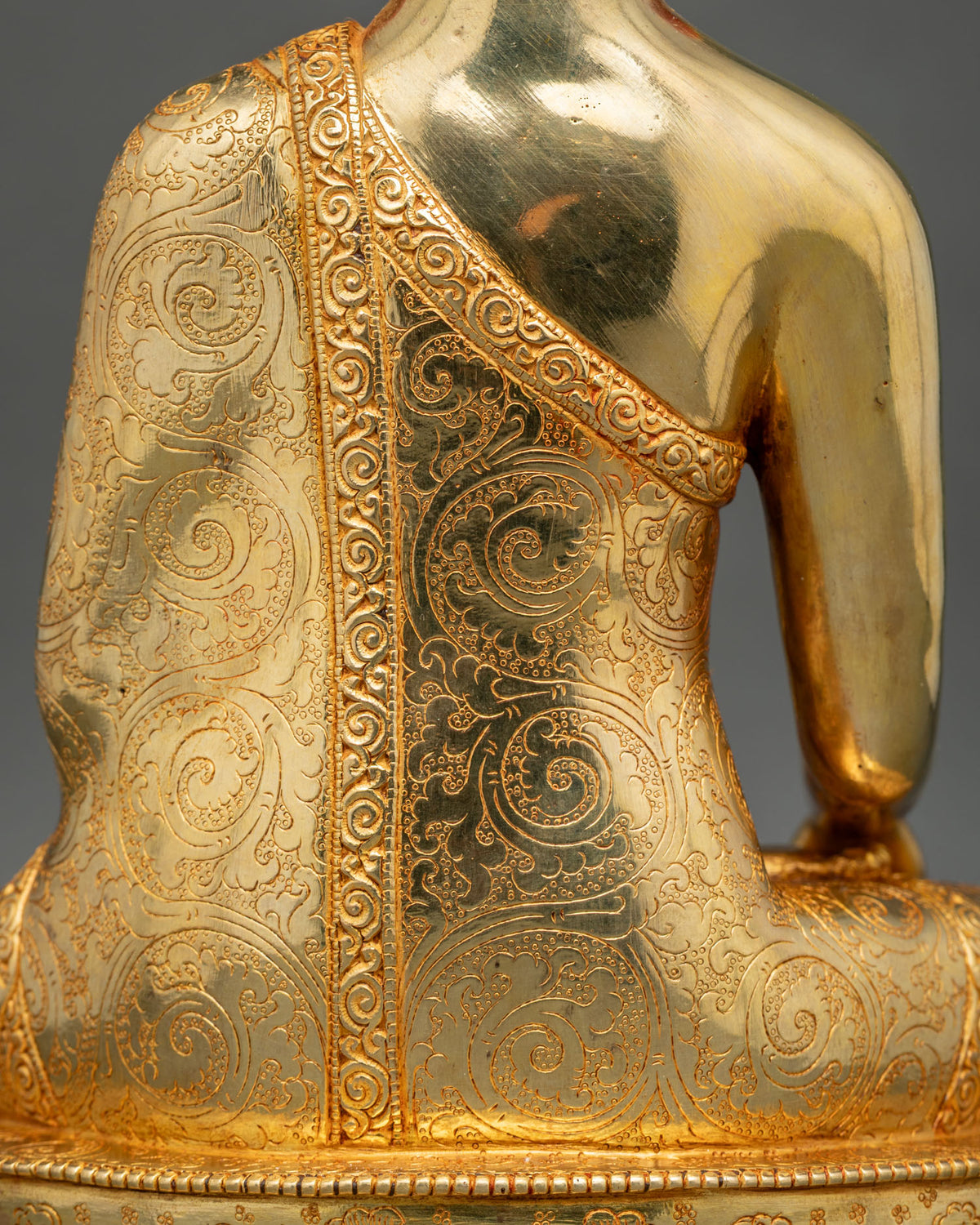 Buddha Shakyamuni Statue showcasing intricate copper carvings, gold fire-gilding, and traditional Newari craftsmanship from Patan, Nepal.