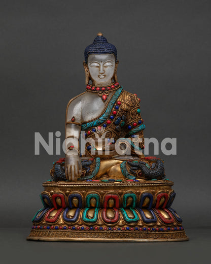 Buddha Shakyamuni statue with crystal body and gold gilded Newari filigree artwork