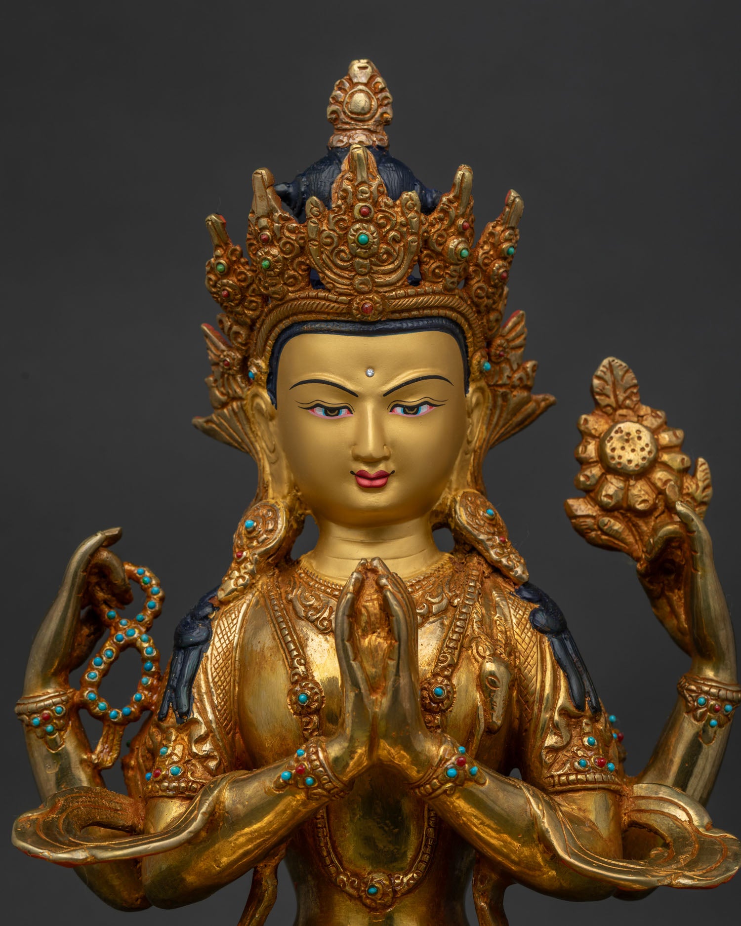 Buddhist Chenrezig Statue with gold painted face and semi precious stones