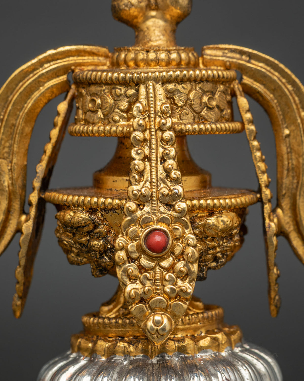 Buddhist Dharma Wheel symbolizing the Noble Eightfold Path and Three Treasures
