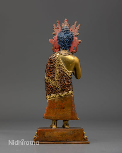 Buddhist Dipankara Buddha statue with gold gilded ornaments and detailed copper carving representing compassion, generosity, protection, and blessings.
