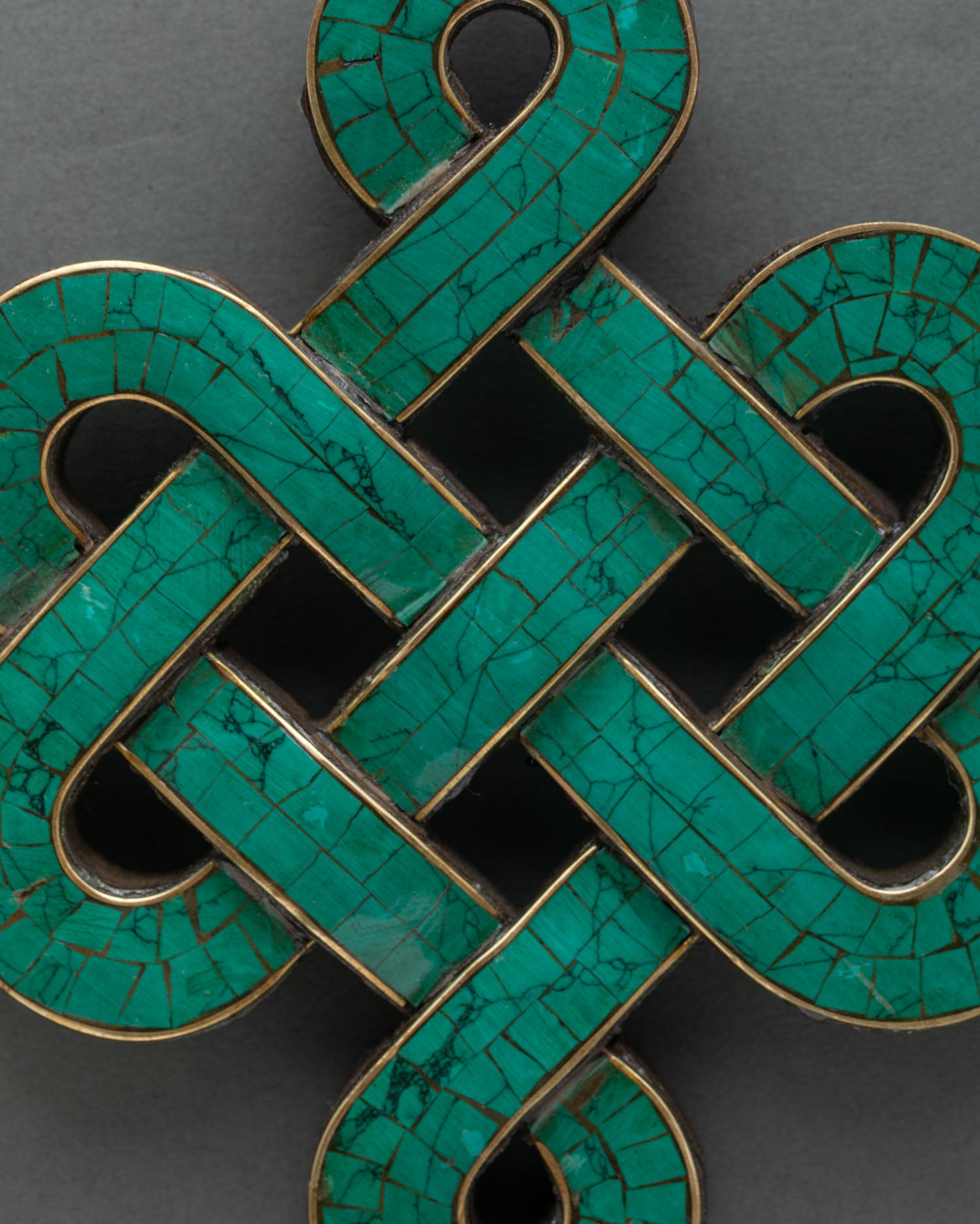 Buddhist Endless Knot wall decor with intricate stone inlay