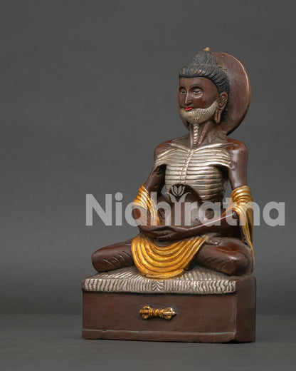Buddhist Fasting Buddha sculpture with gold and silver details, handmade by Newari artisans in Patan, Nepal
