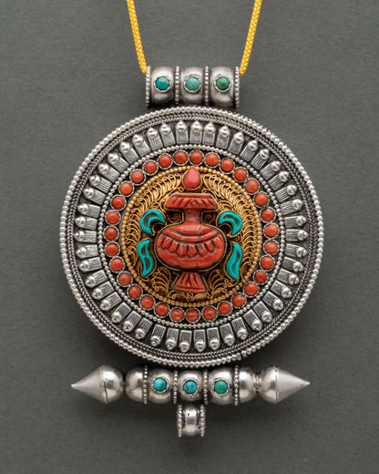Buddhist Ghau Mala adorned with coral and turquoise stones featuring a sacred Treasure Vase symbol