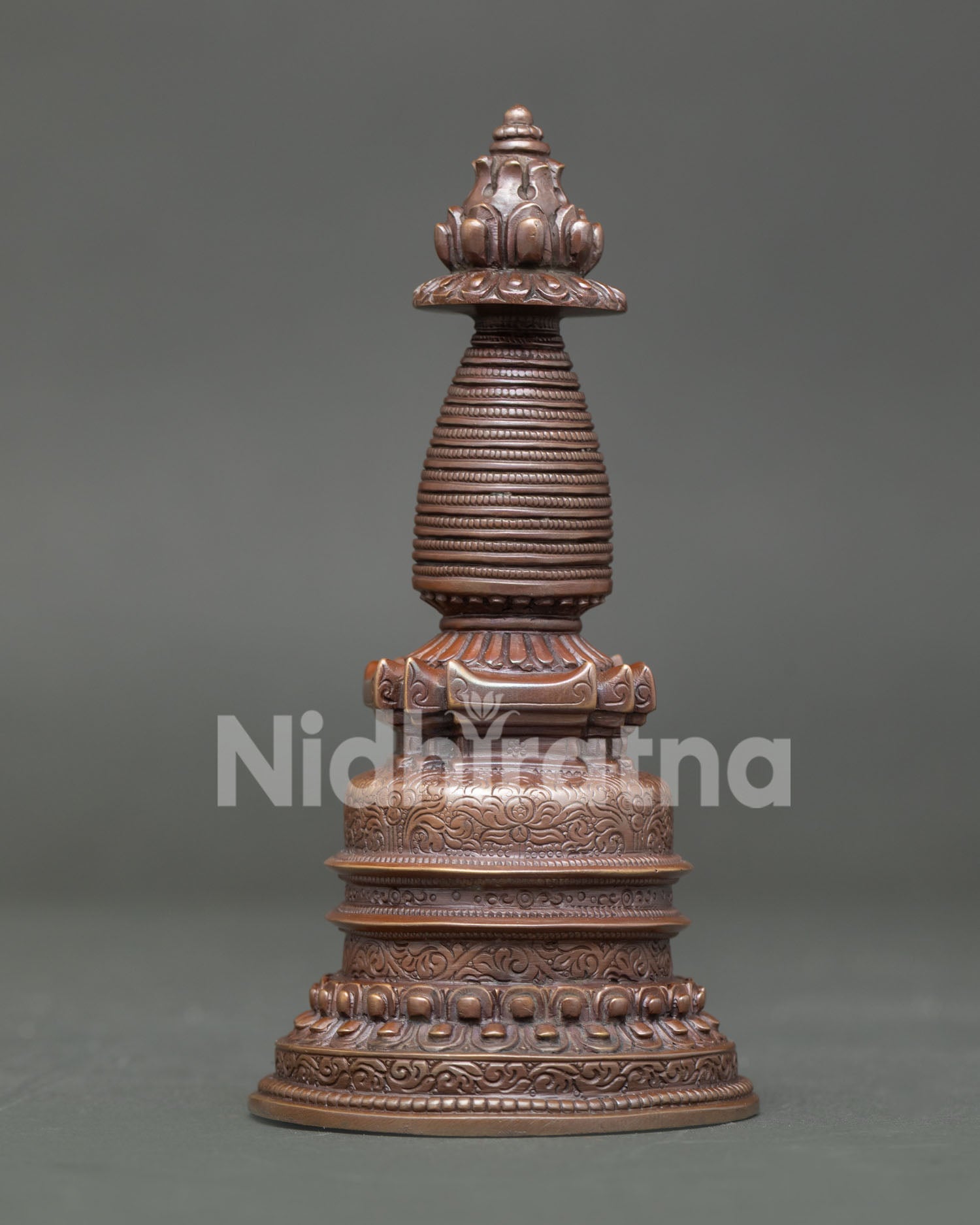 Buddhist Kadampa Stupa with double lotus base and thirteen conical rings design