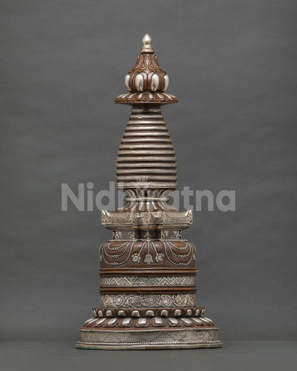 Buddhist Kadampa Stupa with intricate floral motifs and traditional Himalayan metalwork