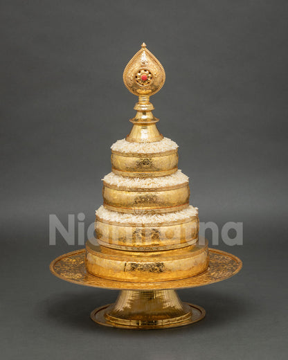 Buddhist mandala offering set with coral stone norbu finial and traditional Himalayan craftsmanship