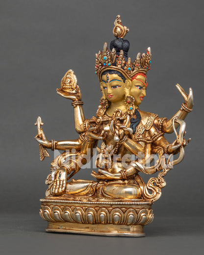 Buddhist Namgyalma deity statue showing six hands with bow arrow Buddha and lasso attributes.