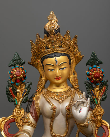 Close-up of White Tara Bodhisattva with seven eyes and five-jewel crown