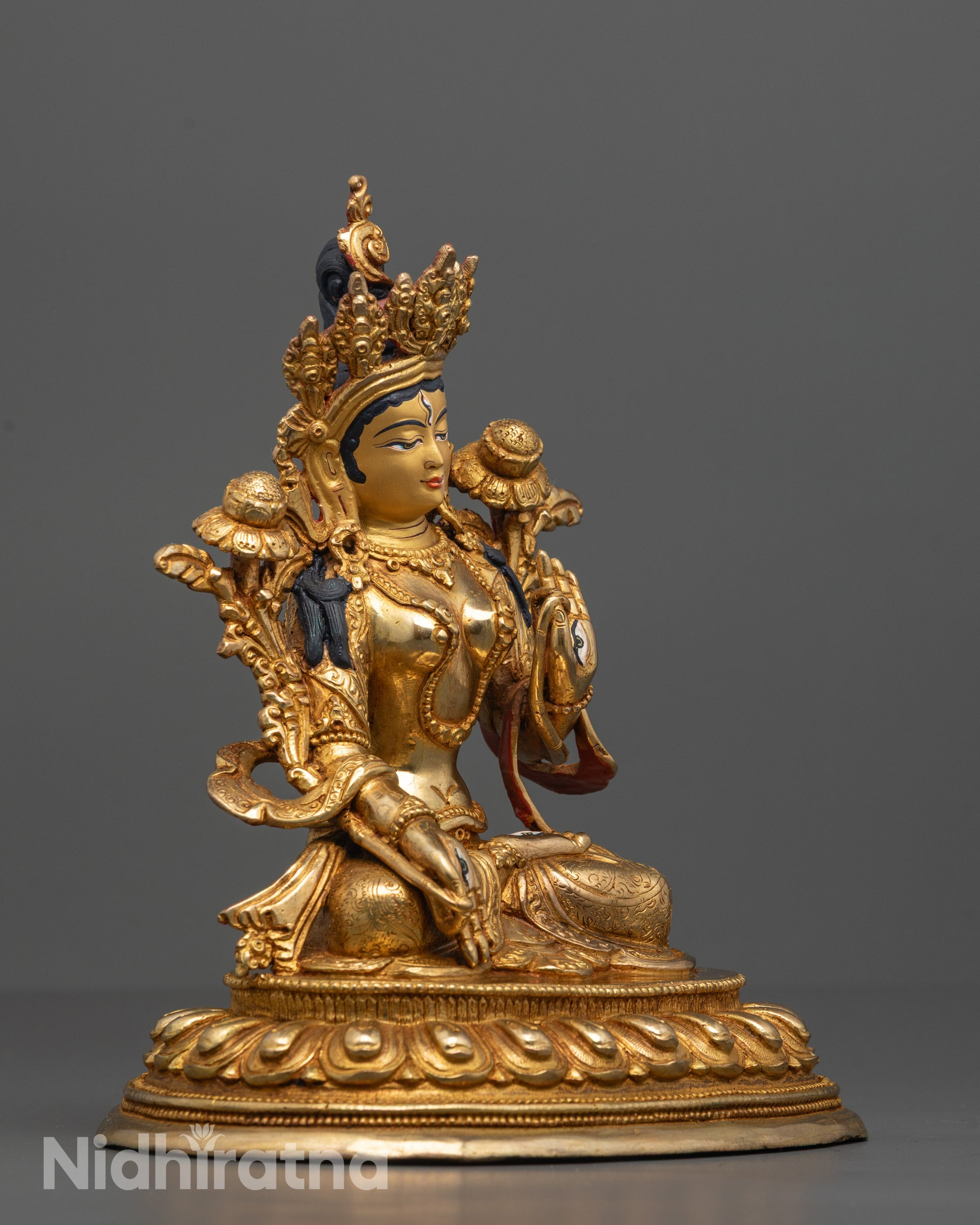 Side View of Peaceful White Tara Sculpture Displaying Artisan Craftsmanship