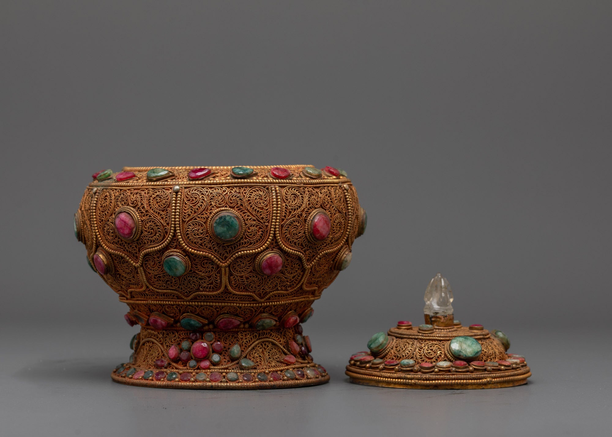 Side angle of handcrafted Dhirpur Rice Pot highlighting copper body and ornate patterns