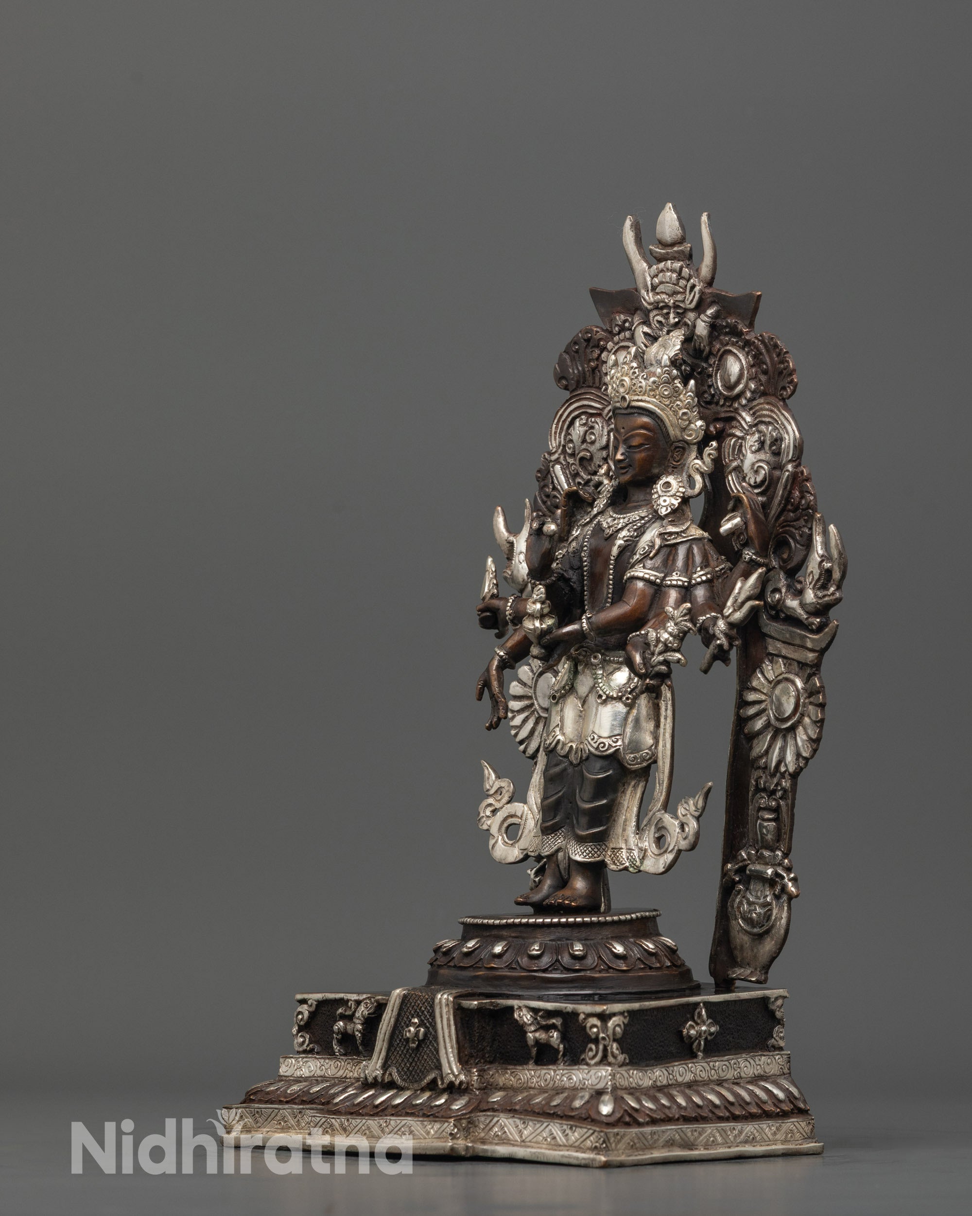 Full view of the silver-finished Lokeshwor statue handcrafted in Nepal