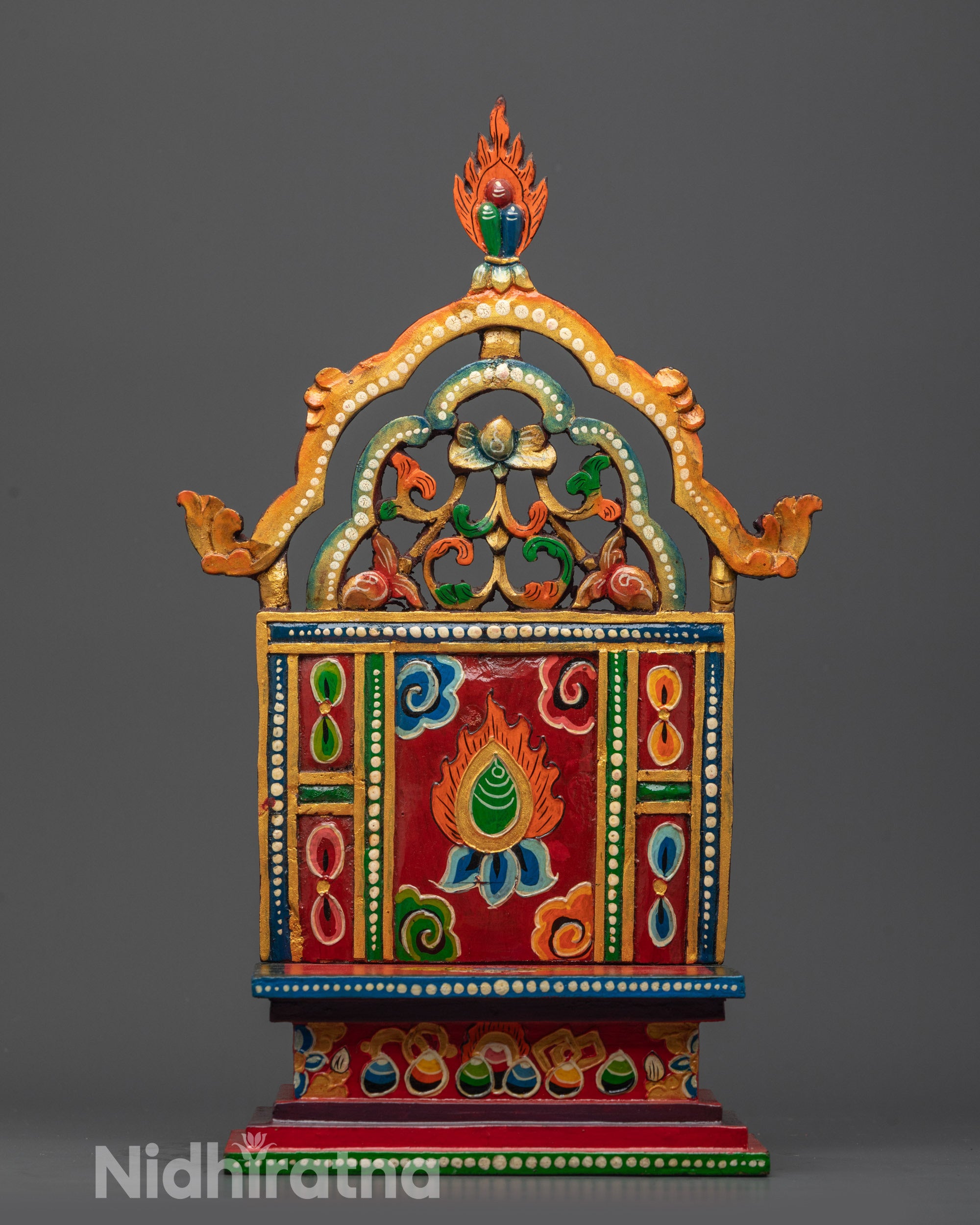 Front view of Traditional Buddhist Throne hand-carved from wood with dharma wheel detail