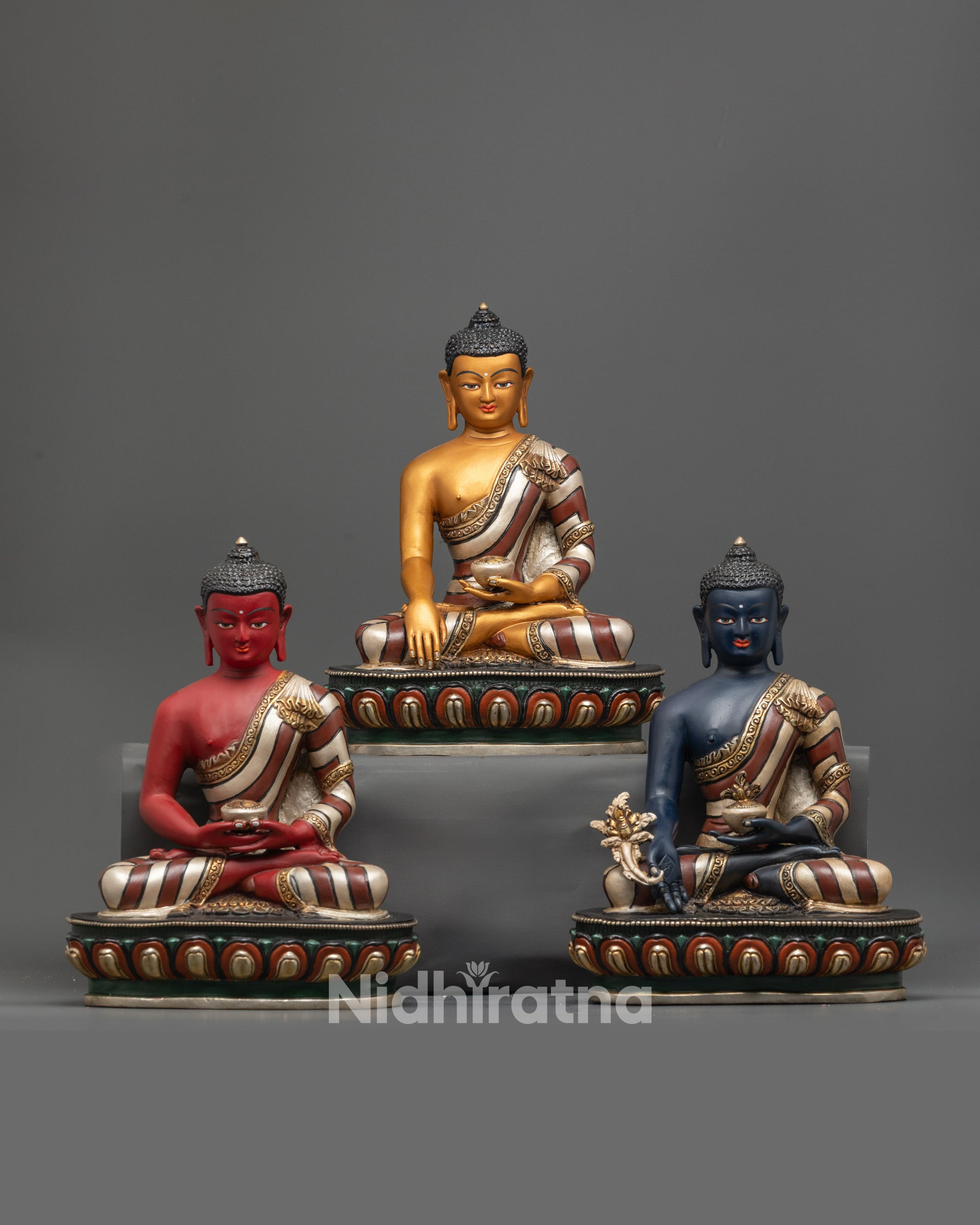 Front view of Three Buddha Statue Set showing Amitabha, Shakyamuni, and Medicine Buddha on lotus.
