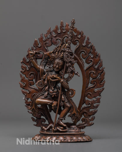 front view of oxidized dorje phagmo statue with khatvanga trident and fierce stance