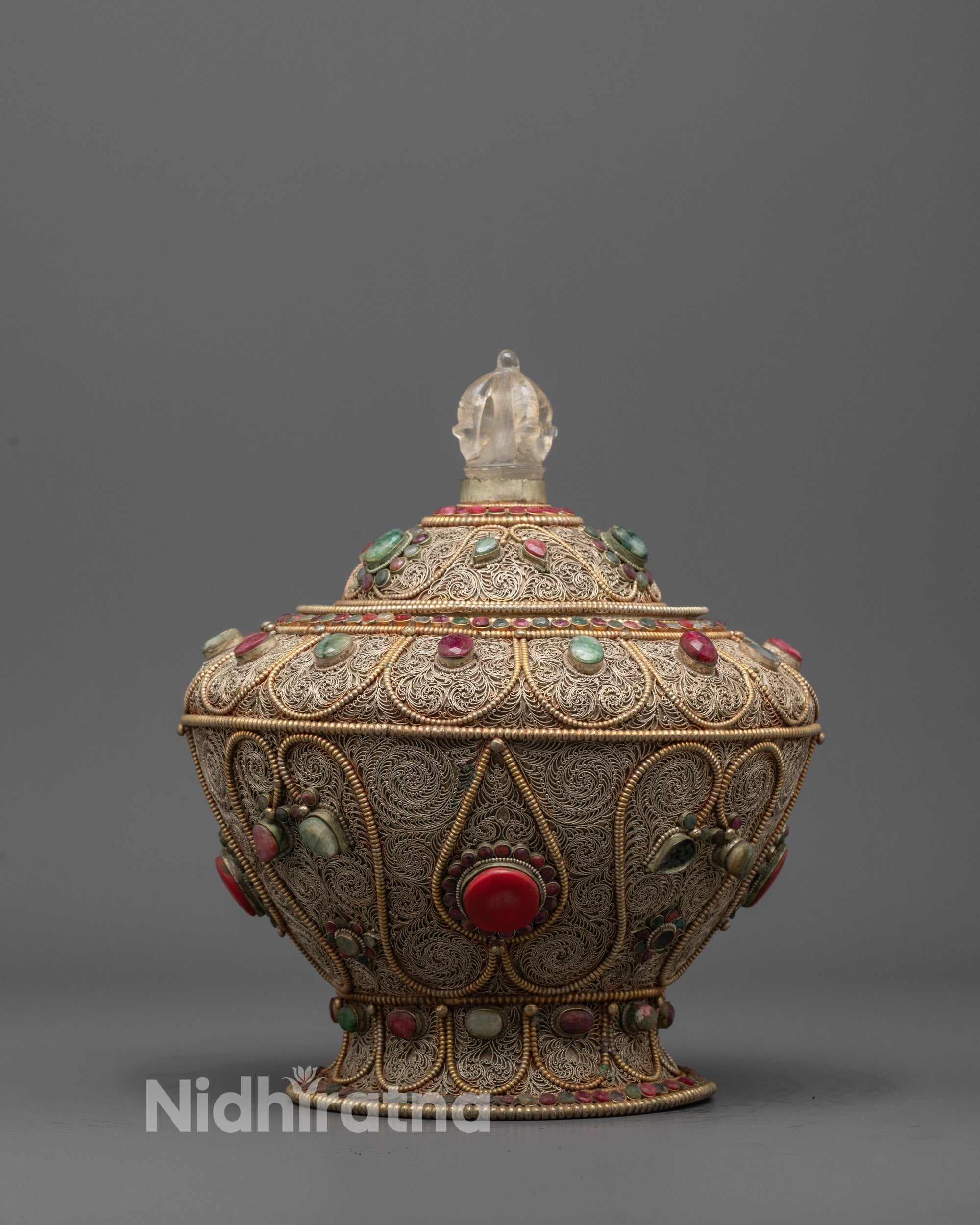 Front view of Traditional Buddhist Rice Pot with silver-plated filigree and semi-precious stones