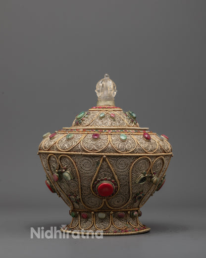 Front view of Traditional Buddhist Rice Pot with silver-plated filigree and semi-precious stones