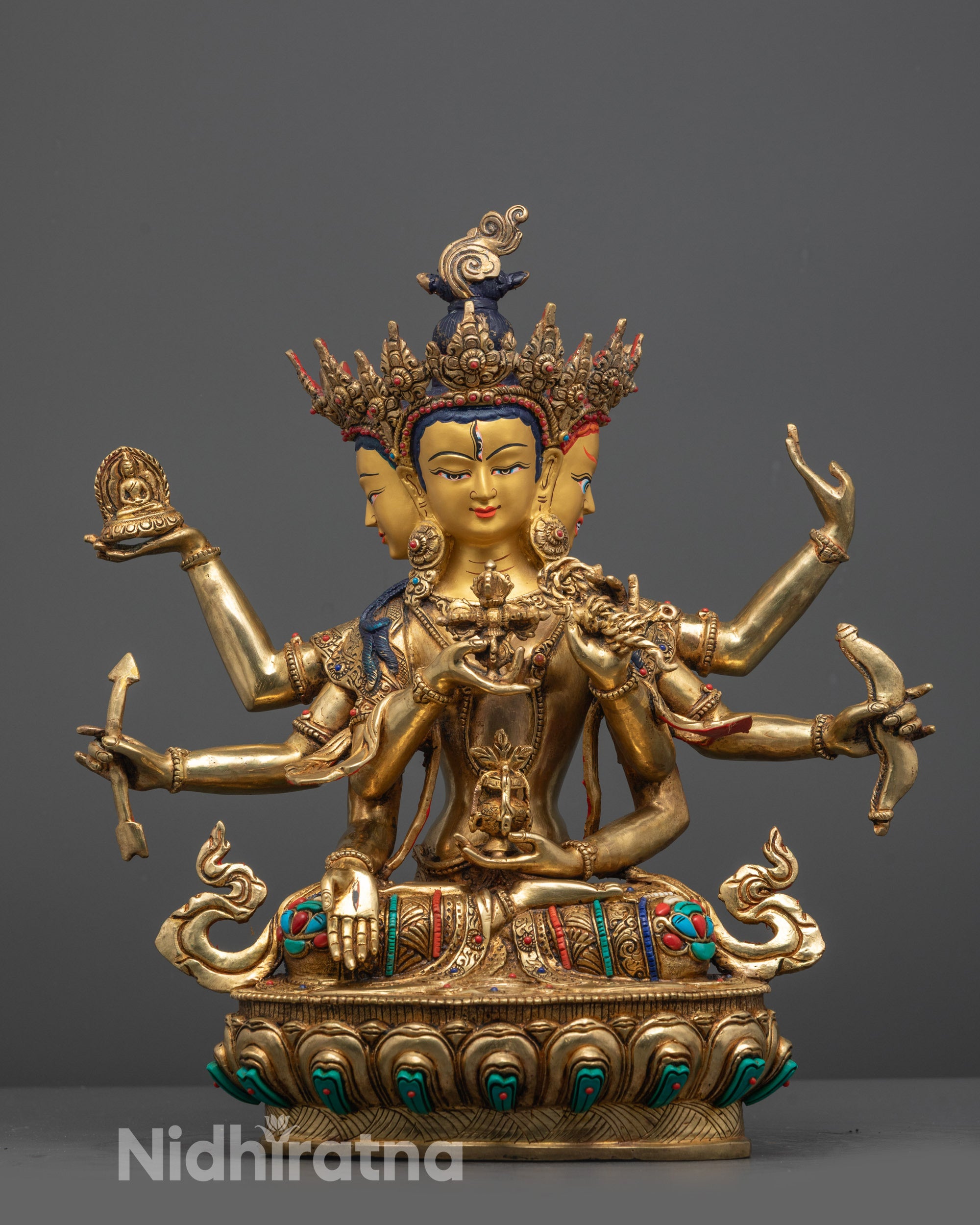 Front view of hand-carved Usnisavijaya Namgyalma Statue with three heads