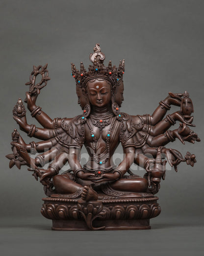 Candrakanti Tara statue, three-faced moonlight healer with many arms, oxidized copper