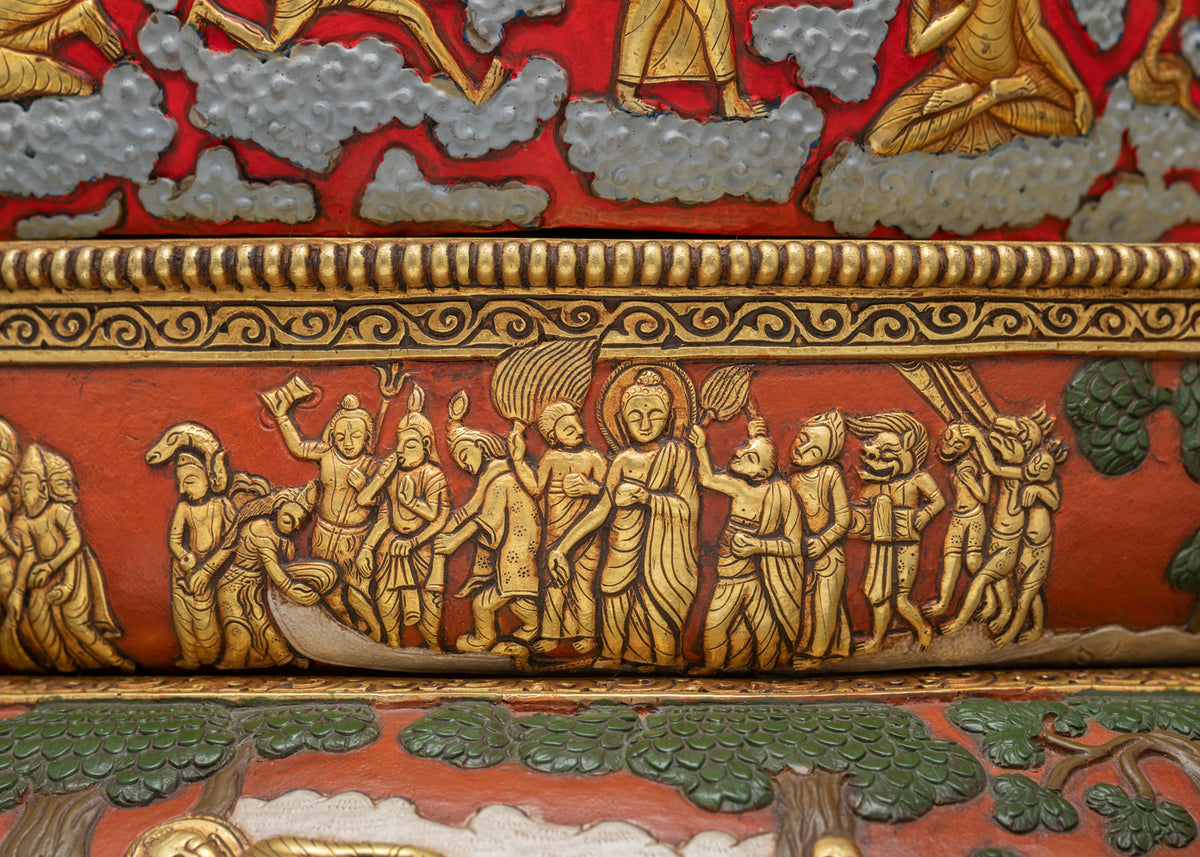 Carved pedestal panel with gold figures from the Buddha’s life on the Shakyamuni Buddha statue