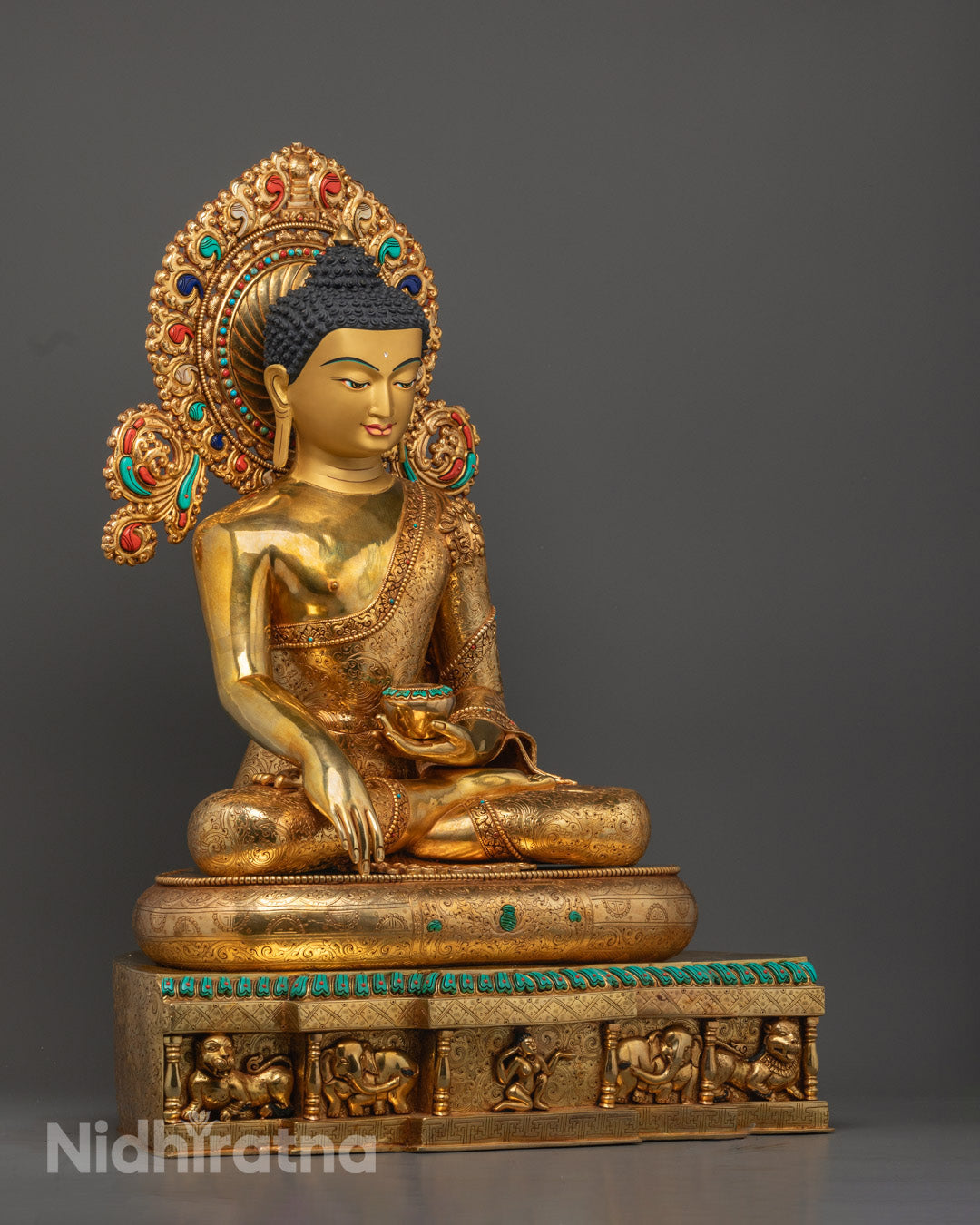  carved robe and halo on Shakyamuni Gautama Buddha statue adorned with semi-precious stones and rich acrylic colors