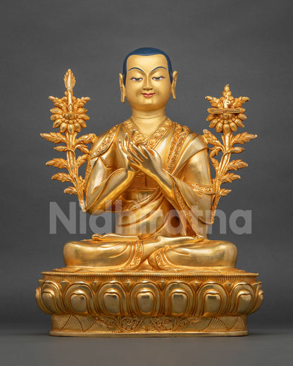 Central Je Tsongkhapa with hands at his heart, framed by gilded flowering stems and a serene smile