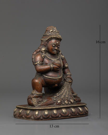 Chemically oxidized Black Dzambhala statue with silver plated finish.