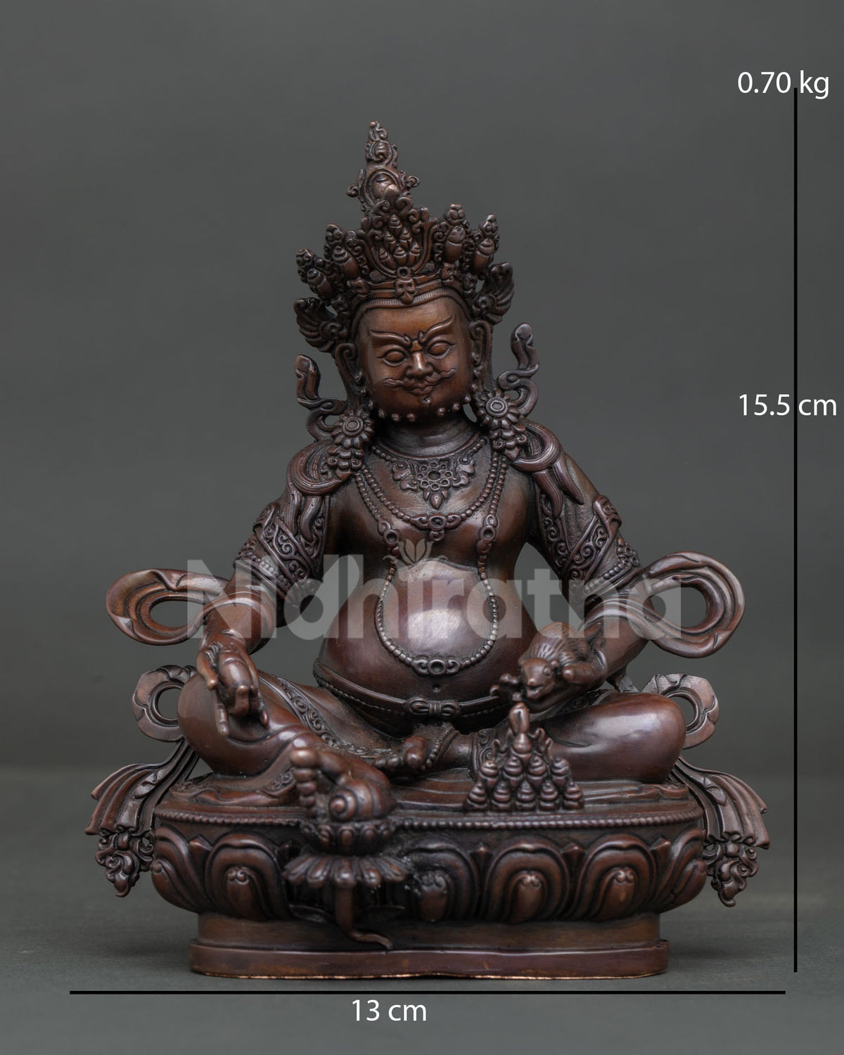 Chemically oxidized copper Dzambhala statue with jewel-spitting mongoose from Nepal.
