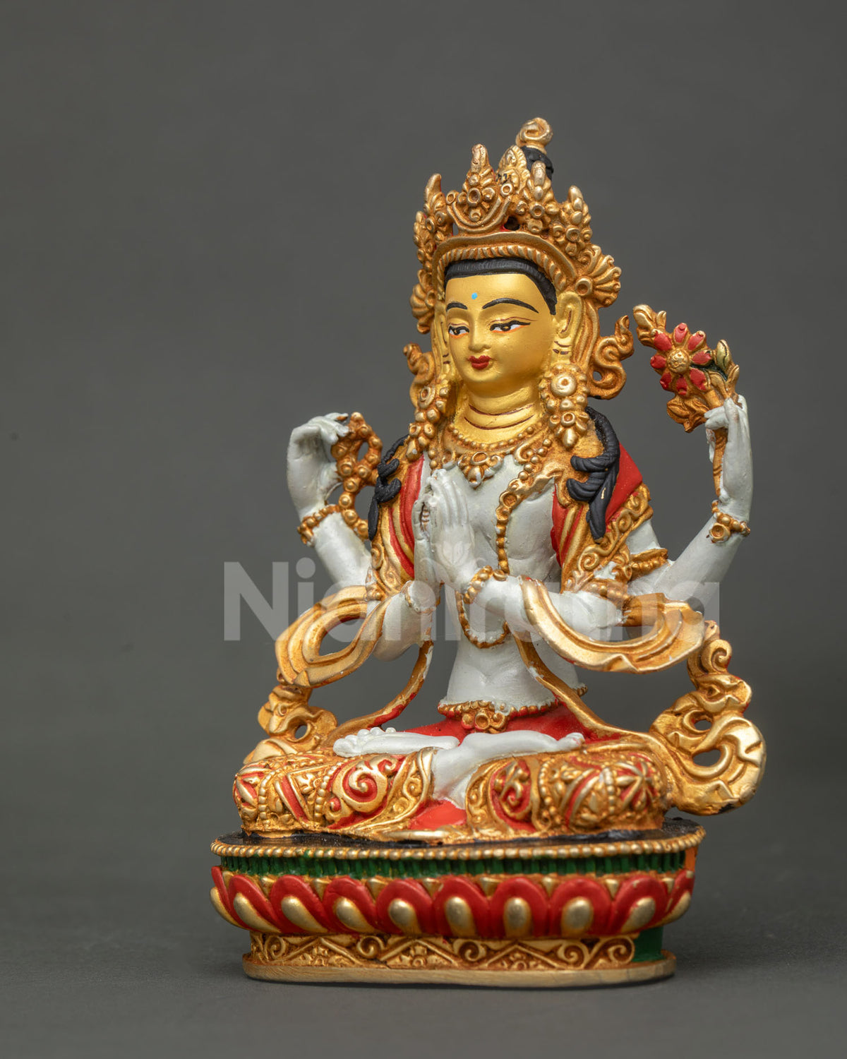 Chenrezig Avalokiteshvara statue with hand carved lotus pedestal.