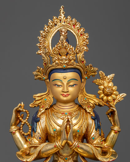 Chenrezig Bodhisattva of Compassion statue with gold-painted face, semi-precious stones, and radiant halo.