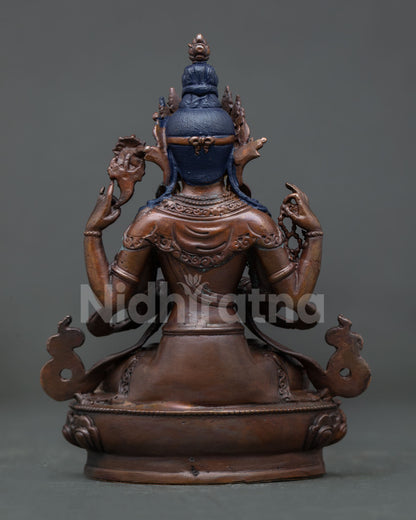 Chenrezig Buddhist statue from Nepal featuring lotus pedestal, compassion symbolism, and sacred meditation design.