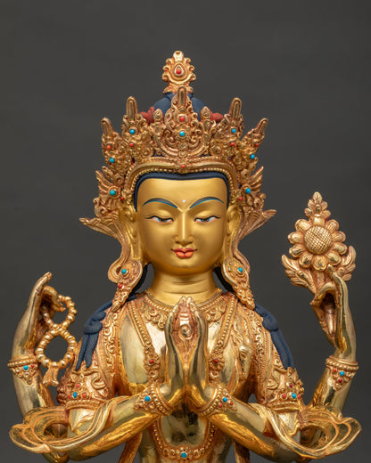Chenrezig buddhist statue with 24k gold painted face semi precious stones and jewel crown.