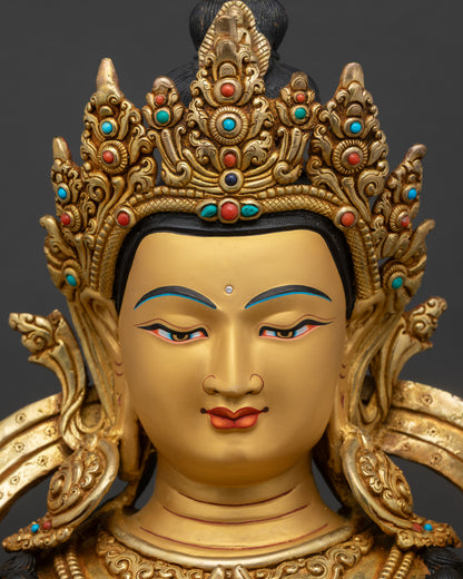 chenrezig face close up gold painted serene expression avalokiteshvara statue