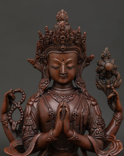 Chenrezig Four Armed Statue Holding Crystal Rosary and Lotus Close Up.