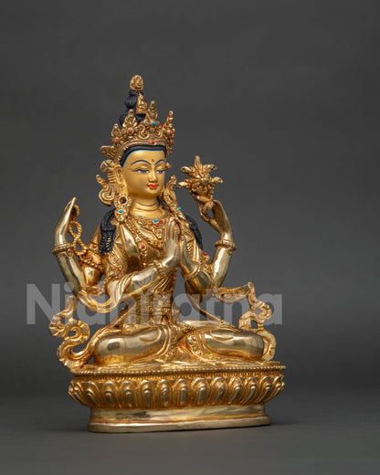 Chenrezig seated on hand carved lotus pedestal holding wish fulfilling jewel in anjali mudra.