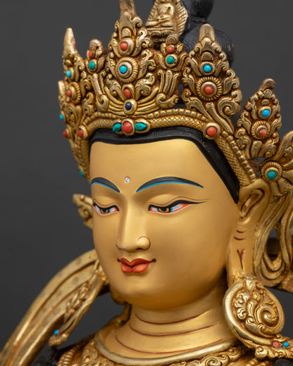 chenrezig side face close up gold painted features compassionate expression