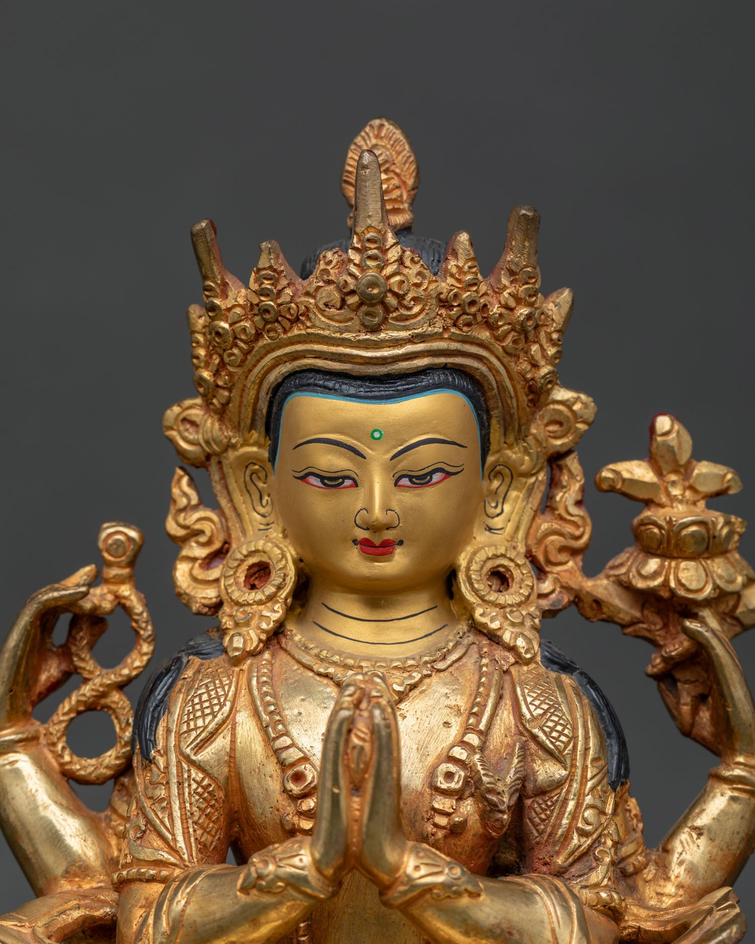 Chenrezig Statue Anjali Mudra with Wish Fulfilling Jewel Close Up.