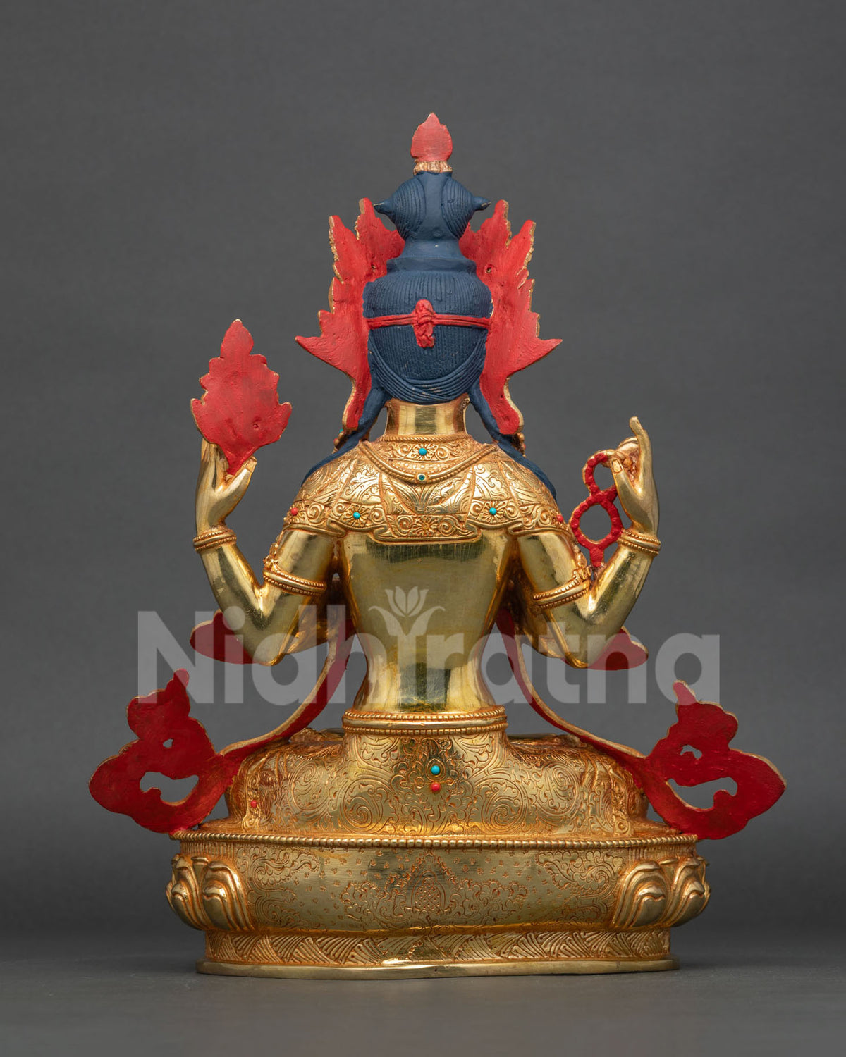 Chenrezig Statue back view gold gilded copper Buddhist sculpture.