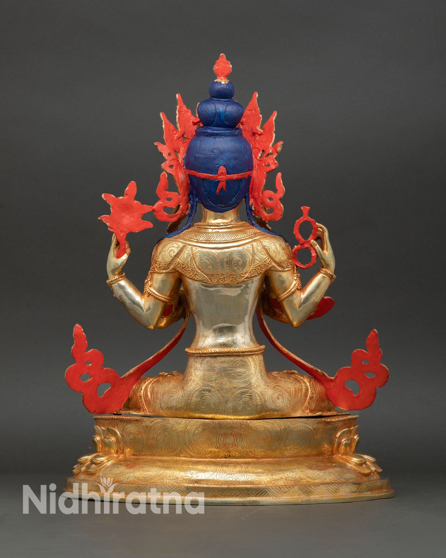 Chenrezig statue back view intricate carving scrolled lotus base Himalayan Buddhist art handmade sacred deity statue