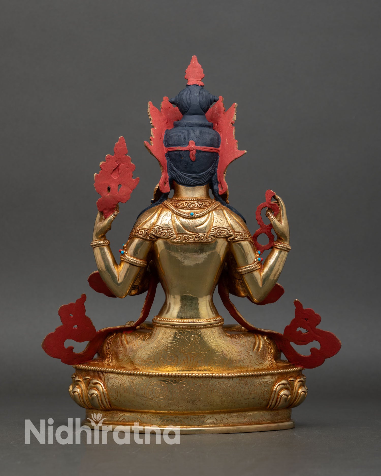 Chenrezig statue back view lotus throne ornate detailing sacred buddhist altar art nepal