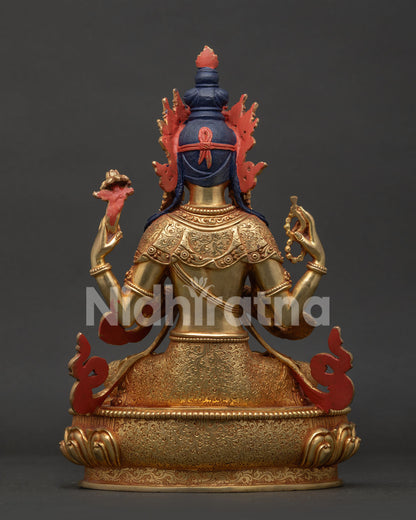 Chenrezig statue back view showing hand carved silk garment and traditional Nepalese artistry.